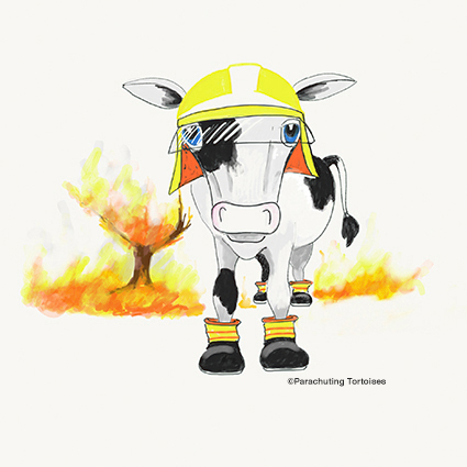 Cartoon cow putting out a fire